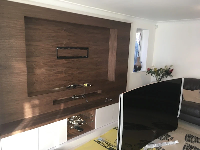 TV wall mount preparation on wood paneling